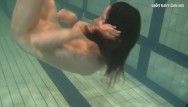 Sweetheart in the swimming pool undressed and slutty